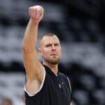 BOSTON, MASSACHUSETTS - JUNE 17: Kristaps Porzingis #8 of the Boston Celtics warms up before Game Five of the 2024 NBA Finals against the Dallas Mavericksat TD Garden on June 17, 2024 in Boston, Massachusetts.