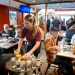 Waitress Rachel Gurcik serves customers at the Gateway Diner in Westville, Pa.