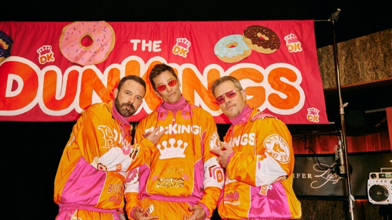 Ben Affleck, Tom Brady, and Matt Damon in a Super Bowl 2024 commercial for Dunkin' Donuts.