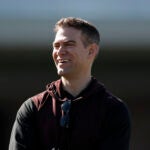 Chicago Cubs president of baseball operations Theo Epstein looks on during a spring training baseball workout Wednesday, Feb. 12, 2020, in Mesa, Ariz.