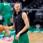 Boston Celtics center Kristaps Porzingis on the court during practice at TD Garden on Sunday. The Celtics will face the Dallas Mavericks in Game 5 of the NBA Finals on Monday.