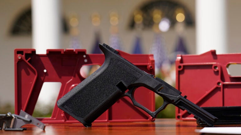 FILE - A 9mm ghost gun pistol build kit with a commercial slide and barrel with a polymer frame is displayed in the Rose Garden of the White House, April 11, 2022, in Washington. Massachusetts Gov. Maura Healey signed a sweeping gun bill into law Thursday, July 25, 2024, that supporters say builds on the state’s existing gun laws, including a crackdown on difficult to trace “ghost guns,” while safeguarding the rights of gun owners.