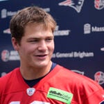 New England Patriots quarterback Drake Maye faces reporters following an NFL football practice, Tuesday, June 4, 2024, in Foxborough, Mass.