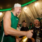 Boston Celtics center Kristaps Porzingis (8) celebrates in the locker room after Game 5 of the NBA Finals. The Boston Celtics hosted the Dallas Mavericks at TD Garden on Monday, June 17, 2024.